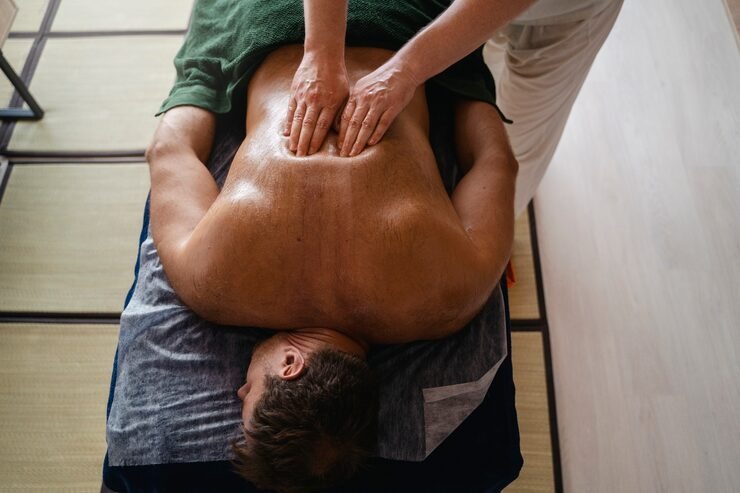 High angle view of a client receiving a massage